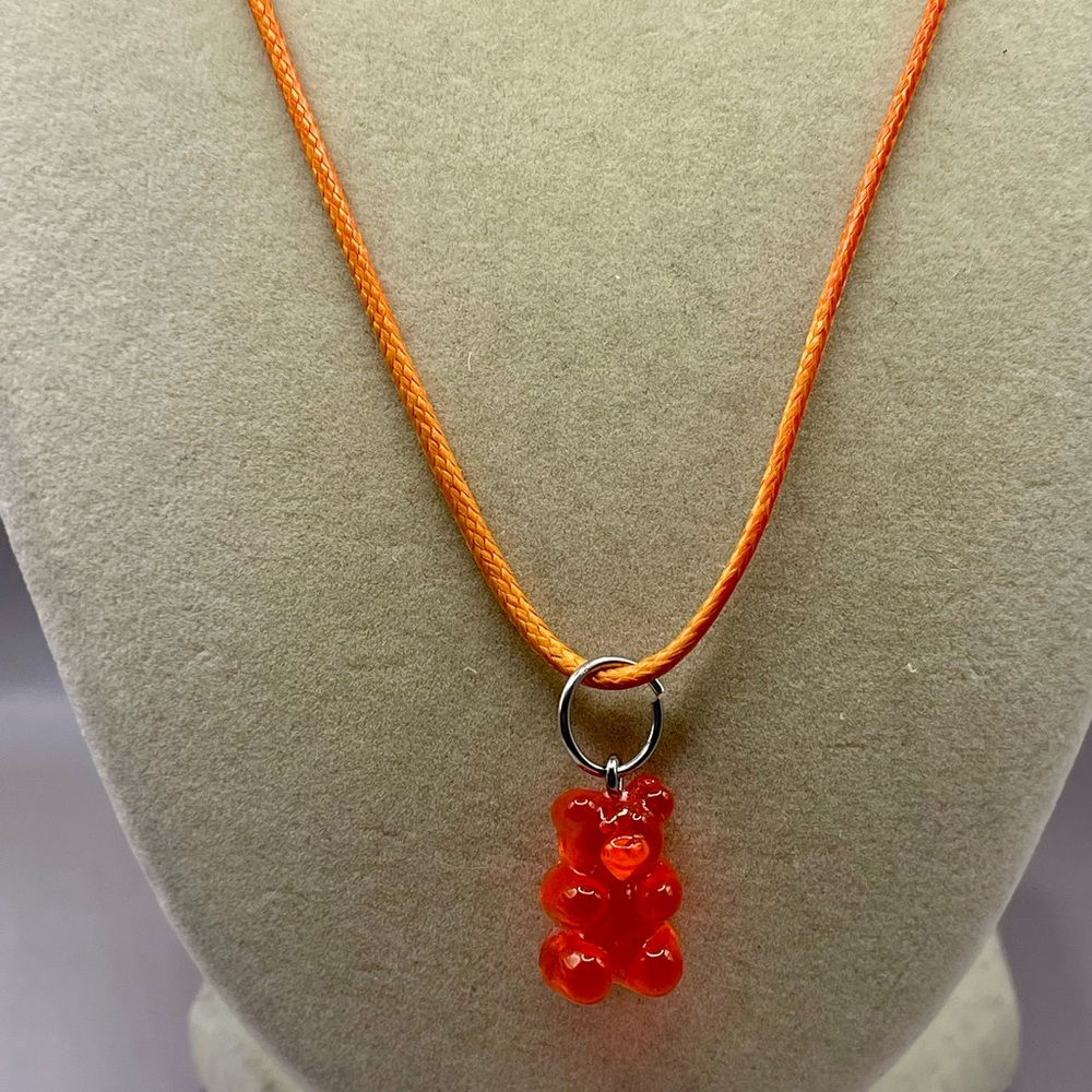 Bright Orange Necklace with Cute Gummy Teddy Bear Pendant on a orange Cord